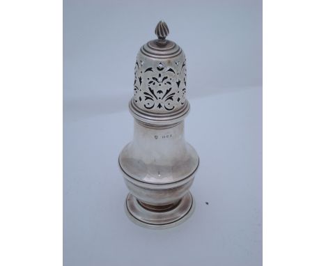 A silver sugar caster, by JB Chatterley & Sons Ltd, London (date letter rubbed), with baluster form body, topped with a finia