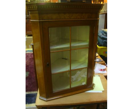 A 19th Century George III style cabinet bookcase, the upper section with astragal glazed doors enclosing later glass shelves 