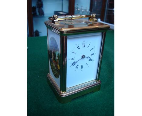 A modern French gilt brass carriage clock by L'Epee, striking on a coil, the backplate signed L'Epee, 1839, with key. 