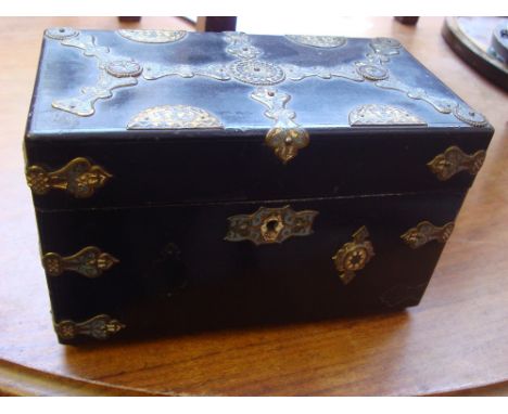 A 19th Century ebonised tea caddy. 25 x 14cm. 