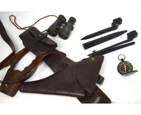 A WWI leather belt and holster for pistol, a pair of WWI field glasses, a bayonet, spike bayonet and military compass (5).