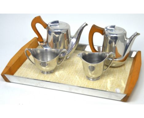 A c1950s Picquot four-piece tea service with tray.