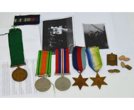 Three WWII medals relating to James Philip Cubbon; the Atlantic Star, the Defence Medal and the British War Medal and a WWI M