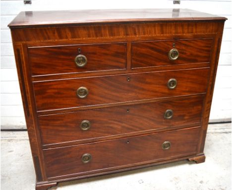 A late 19th century mahogany chest of drawers, two short drawers over three long with specimen cross-banding, marquetry inlay