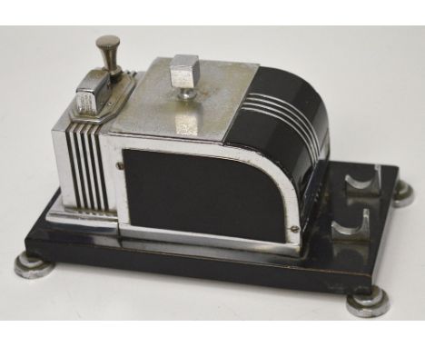 An Art Deco Ronson touch tip lighter cigarette dispenser, 12 x 2.2cm.