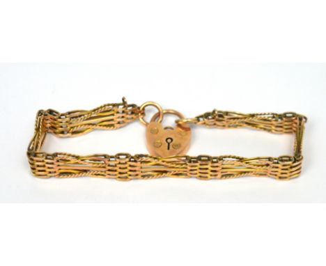 A 9ct yellow gold five-bar fancy gate bracelet with 9ct gold padlock, approx 15.9g.