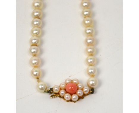 A Boodle & Dunthorn single-strand pearl necklace with 9ct gold clasp set with small pearls and coral, approx length 46cm.