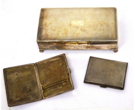 Two hallmarked silver cigarette cases; a small engine-turned example, Adie Bros Ltd, Birmingham 1925 and another similar exam