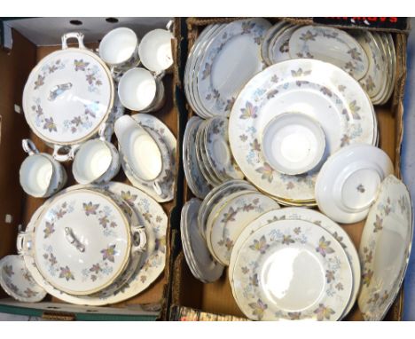 A Paragon 'Enchantment' pattern part dinner service comprising two tureens, two milk jugs, gravy boat and stand, six cups and