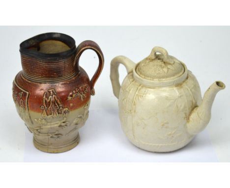 A William III salt-glazed decorative jug with hunting scene, with hallmarked silver rim, height 19cm and a similar period Ori