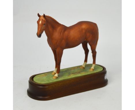 Royal Worcester; a figure of a racehorse 'Hyperion' modelled by Doris Lindner 1965, on fitted wooden plinth, height 26cm.   C