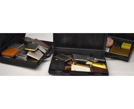A large quantity of cigarette cases and boxes to include a featherweight faux bone case, a niello case and matching lighter s