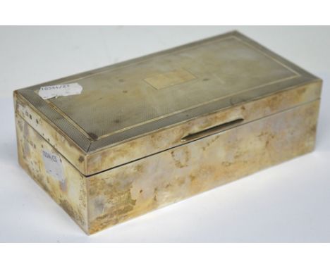 An Elizabeth II hallmarked silver engine-turned cigarette box with wood lining, John Rose, Birmingham 1961, length 16.5cm.