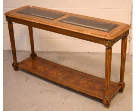 A reproduction walnut console table with two bevelled glass inserts to top, sectioned veneer to under shelf and tapering flut