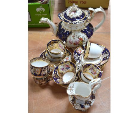 Attributed to Caughley; an early 19th century teapot, cobalt blue panels alternating with panels of floral decoration, gilt-h