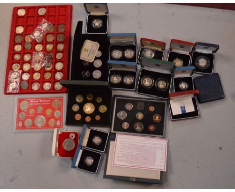 A quantity of cased limited edition British sterling silver coins to include a 1979 Pobjoy Mint Isle of Man Tyndwald Milleniu