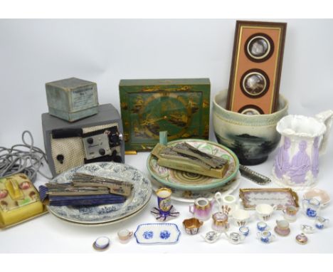 A quantity of ceramics to include early 20th century jugs, an electric clock in an Oriental-style green-painted wooden case, 