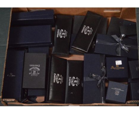 A quantity of Everton FC corporate gifts to include ten Aquascutum engraved pens, ten silver-plated key rings with engraved E