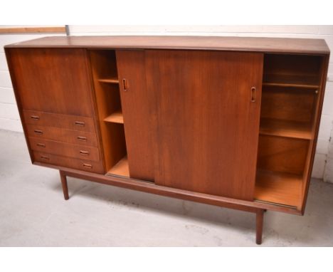 A large 1950s teak Dalescraft sideboard, supplied by Heals, right-hand side with sliding cupboard doors, left-hand side with 