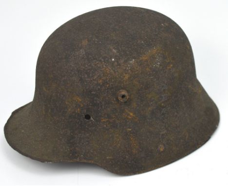 A WWI German 'coal scuttle' helmet (found in Falaise Gap France).