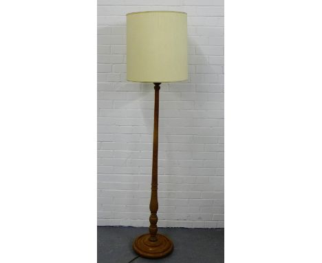 An oak standard lamp and shade 