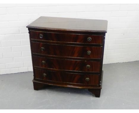 A mahogany bow front chest with four long drawers 75 x 78cm 