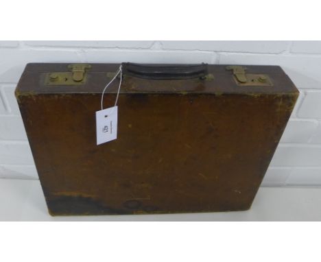 A vintage brown leather brief case 