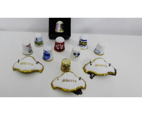 A mixed lot to include three Aynsley white porcelain and gilt edged decanter labels to include two marked Sherry and one Scot