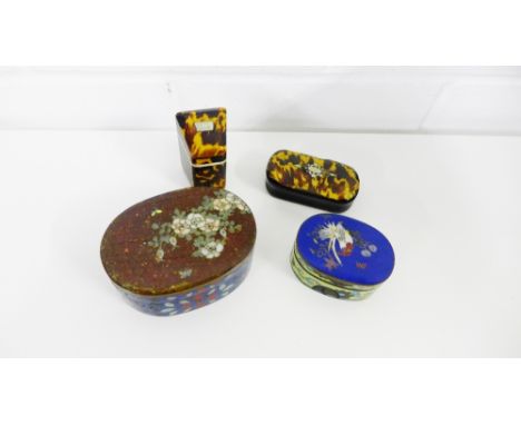 A snuff box, the rectangular tortoiseshell lid with pique work decoration together with a miniature tortoiseshell slope front