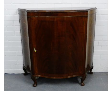 A mahogany bow fronted cupboard on carved cabriole supports, 100 x 105cm