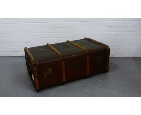 A steamer trunk with an Orient Line vintage label, 34 x 84cm