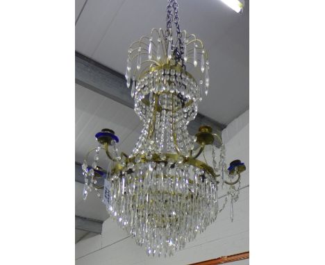 A Scandinavian style six branch chandelier with blue glass sconces and clear hanging lustres, 