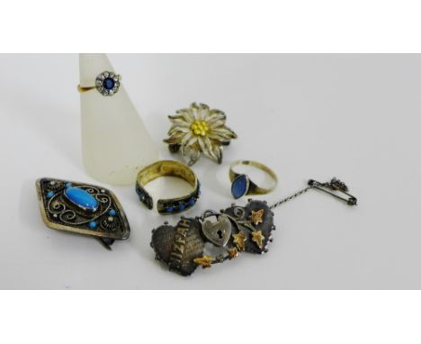 A mixed lot to include a 9 carat gold gemset dress ring, sterling silver opal set ring, Mizpah brooch and white metal brooche