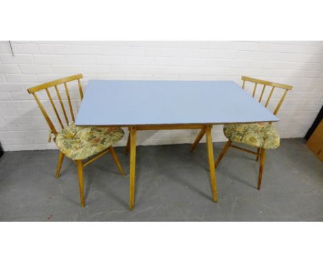 A pair of vintage Ercol 'stacking chairs', together with a blue formica topped kitchen table, (3) 