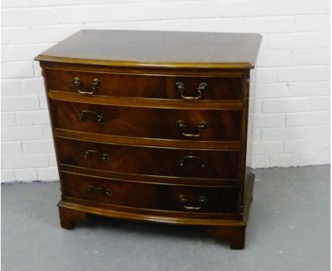 A mahogany bow front chest, fitted three long drawers, raised on bracket supports, 74 x 78cm 