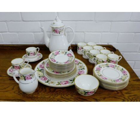 A Royal Worcester Royal Garden patterned coffee service, comprising coffee pot, cream jug, sugar bowl, cake plate, twelve cof