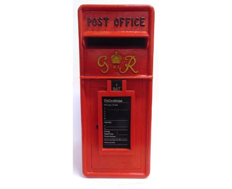 A CAST METAL POST OFFICE LETTER BOX  painted red, the door marked 'G VI R' and with raised lettering 'W T ALLEN &amp; CO / LO