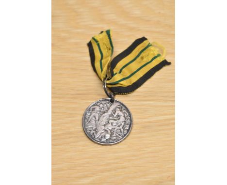 A East &amp; West Africa Medal, the straight bar suspender missing replaced with a hole &amp; ring, with ribbon to W.J.SPARKS