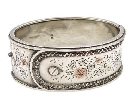 Victorian silver hinged bangle, buckle design with engraved and applied gold decoration by Jackson Brothers, Birmingham 1886