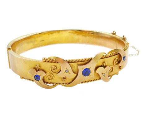 Edwardian 9ct gold blue stone and diamond chip hinged bangle, Chester 1909