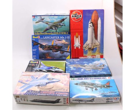 A collection of mixed model kits, with examples including a Revell 1/72nd scale Avro Lancaster, an Italeri 1/48th scale F-14A