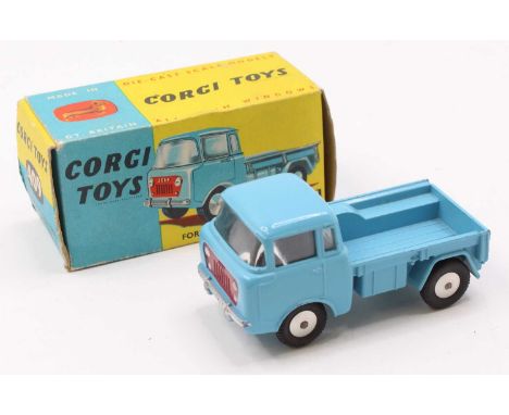 Corgi Toys No. 409 Forward Control Jeep, light blue body with red grille, flat spun hubs, in the original blue and yellow all