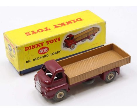 Dinky Toys No. 408 Big Bedford lorry, maroon cab and chassis, light tan back with cream hubs, in original lidded all card box