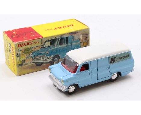 A Dinky Toys No. 407 Ford Transit van comprising of light blue body with white roof and red interior, complete with Kenwood l