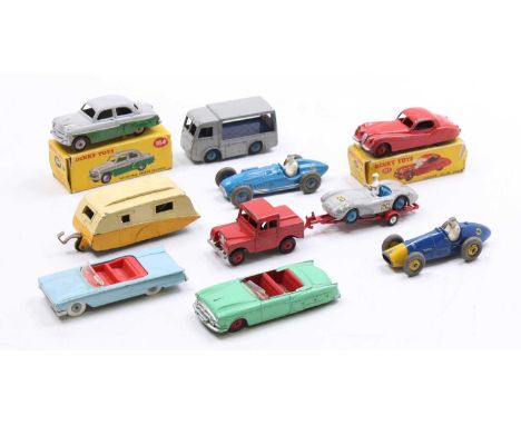 A collection of part boxed and loose play-worn Dinky Toys, with examples including No. 23H Ferrari Racing Car, No. 255 Mersey