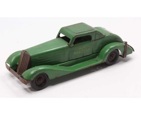 A Large Pressed Steel Marx Clockwork Police Department Vehicle, green example with fixed key mechanism and yellow lettering, 