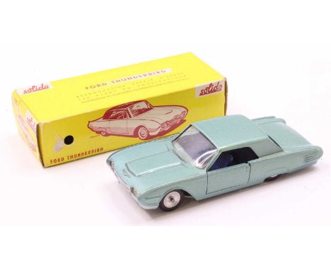A Solido No. 128 Ford Thunderbird comprising of light metallic green body with spun hubs and dark blue interior