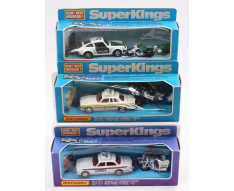 One tray containing a quantity of Matchbox Superking Police interest to include a K-71 Polizei Porsche Police set, a K-66 Jag