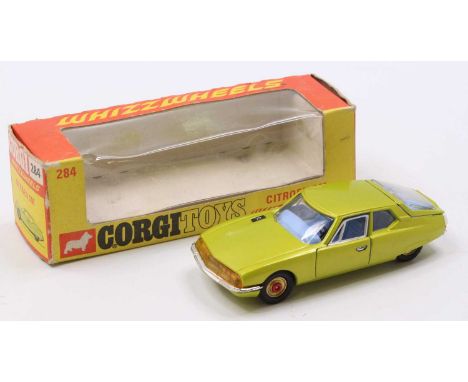 Corgi Toys No. 284 Citroen SM, metallic green body, with blue interior, a very rare issue with red spot wheels fitted instead