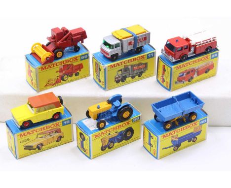 A collection of six boxed Matchbox E type boxed diecast vehicles to include No. 39 Ford tractor, No. 40 Hay trailer, No. 18 F